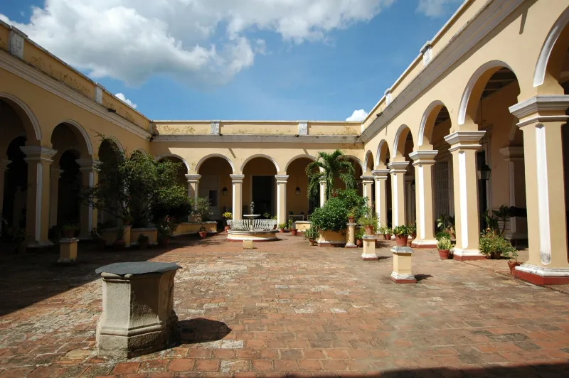 What the Courtyard Keeps: Reading the Hidden Histories of Quinta Avenida's Gardens and Forgotten Spaces